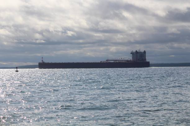 istock Coal Freighter Ship off of Mackinac Island Ocean View 1365927419