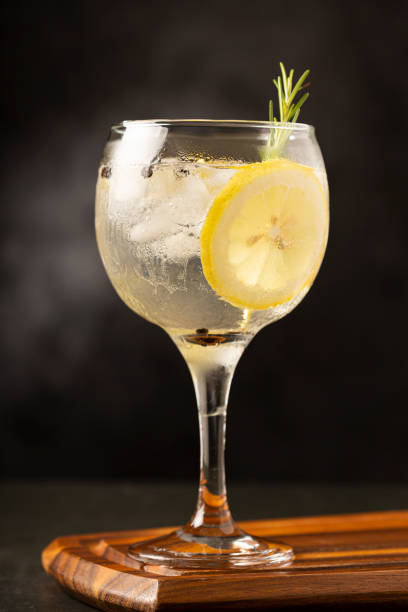 istock Gin Tonic garnished with lemon and rosemary. 1365929707