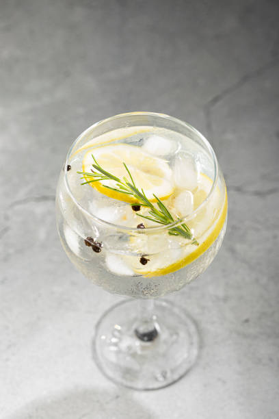 istock Gin Tonic garnished with lemon and rosemary. 1365929846