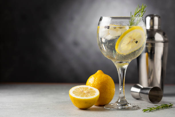 istock Gin Tonic garnished with lemon and rosemary. 1365929910