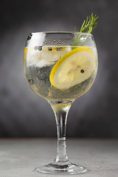 istock Gin Tonic garnished with lemon and rosemary. 1365929924