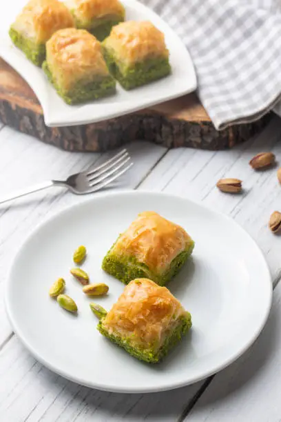 Photo of Traditional delicious Turkish dessert; pistachio baklava (Turkish name; kuru baklava)