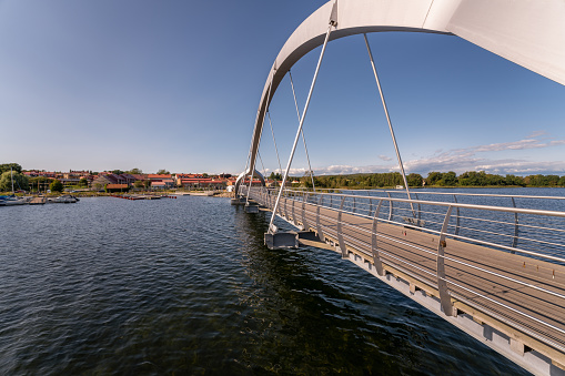Solvesborg, Sweden - Aug 22, 2021: The Solvesborg Bridge is a 760 meter long walk and biking bridge over the Solvesborg Bay Area in Blekinge, Sweden.