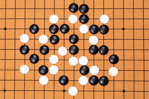istock chinese game go,  Gobang and go game board 1365935458