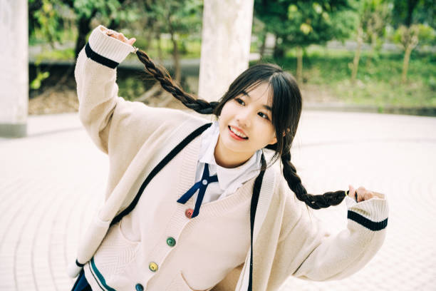istock Happy young asian girl 1365935587