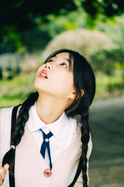 istock Happy young asian girl 1365936782