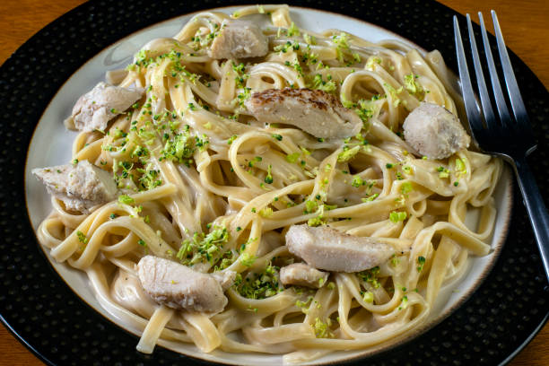 istock fettuccine top with broccoli and chicken 1365940523