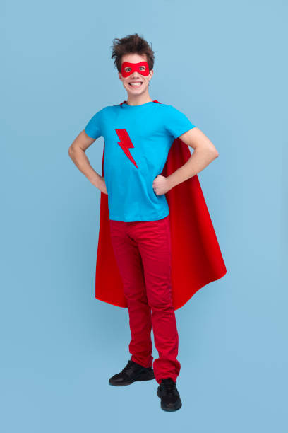 istock Funny man in superhero costume 1365941113