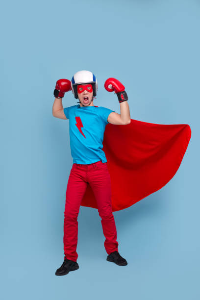 istock Brave superhero showing muscles in studio 1365941115