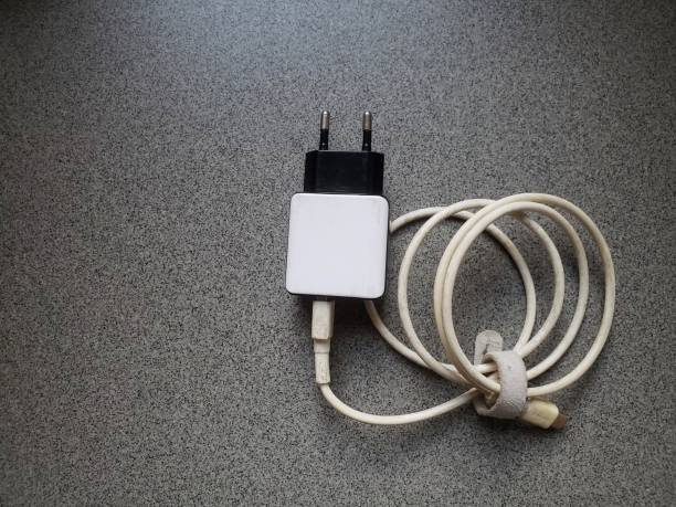 istock close up a cell phone charger on a gray background 1365946516