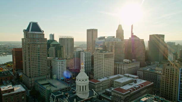 istock Low Sun Behind Downtown Baltimore - Aerial 1365952685