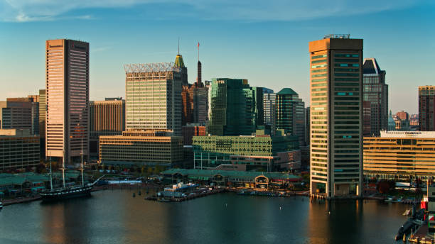 istock Drone Shit of the Inner Harbor and Downtown Baltimore at Sunset 1365952689