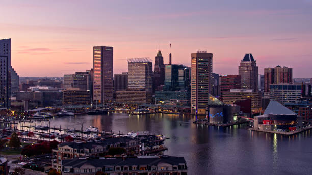 istock Lights Coming On After Sunset in Baltimore Around Inner Harbor - Aerial 1365953218