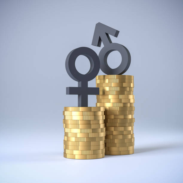 Gender pay gap concept: Two heaps of coins with different height and male and female symbols on top. stock photo