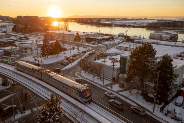 Metro line moves along track outdoors in winter