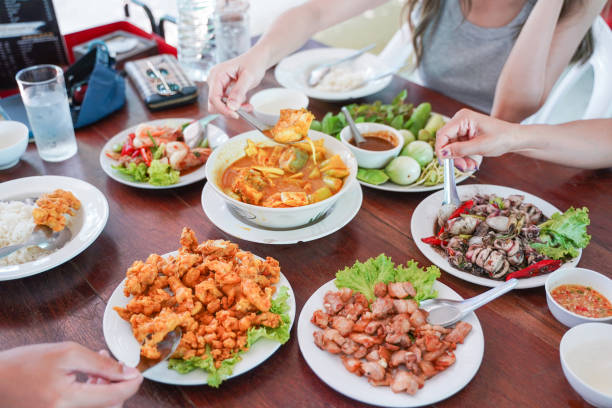 istock eating thai food at restaurant 1365960796