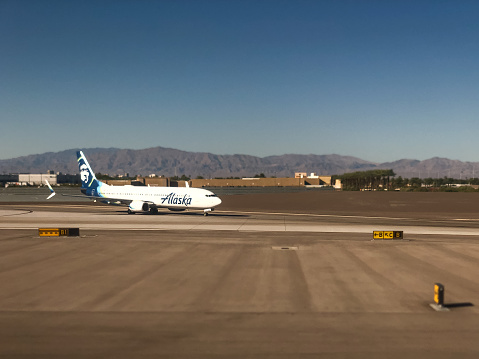 Las Vegas, USA - Sep 30, 2019: An Alaska Airlines jet departing the Las Vegas Airport late in the day.
