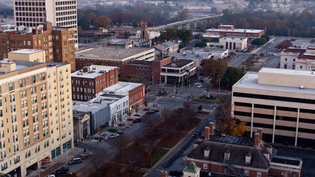 istock Car Driving Through Downtown Macon at Sunrise - Aerial 1365967496