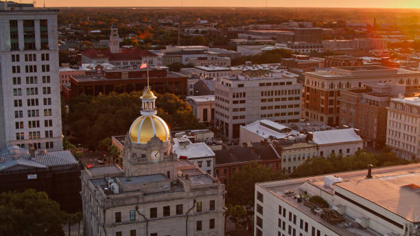 istock Drone View Over Savannah City Hall at Sunset 1365968380