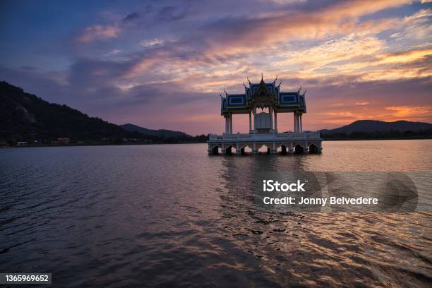 Buddhist Shrine On A Lake At Sunset Stock Photo - Download Image Now - Architecture, Asia, Autumn