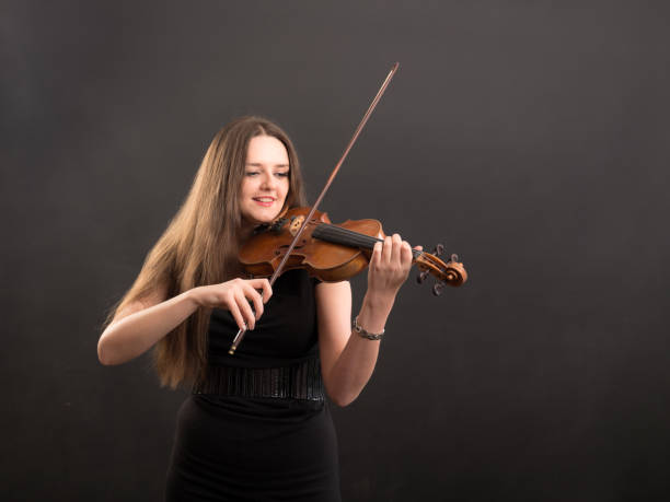 istock studio portrait of a violinist 1365972965