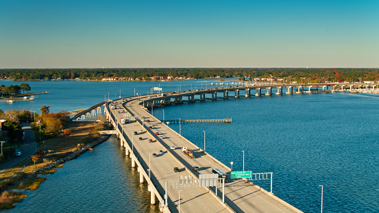 Aerial shot of freeway in on the West Norfolk Bridge between Norfolk and Portsmouth, Virginia on a sunny morning in Fall.