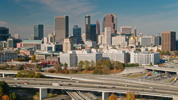 istock Drone Shot of Freeway Interchange and Downtown Atlanta 1365974740