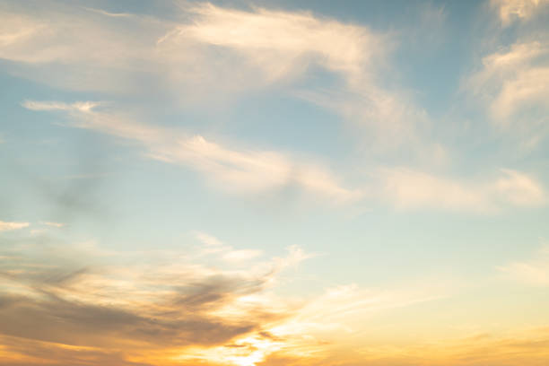istock Low angle view of beautiful clouds pattern in sky at sunset 1365975571