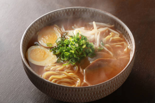 Ramen with steaming sizzle Ramen, ramen, Chinese noodles, steam, hot, soy sauce, up, sizzle, ramen, close-up, freshly made, warm auriculariales photos stock pictures, royalty-free photos & images