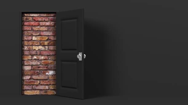 istock Black door and brick wall. 1365982068