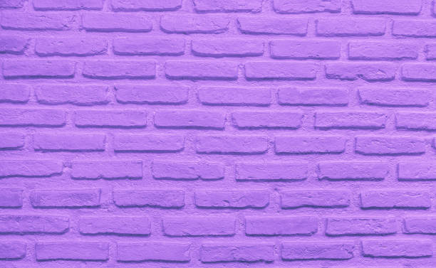 istock Abstract weathered texture stained old stucco light clean color and aged paint concrete purple brick wall background 1365983078