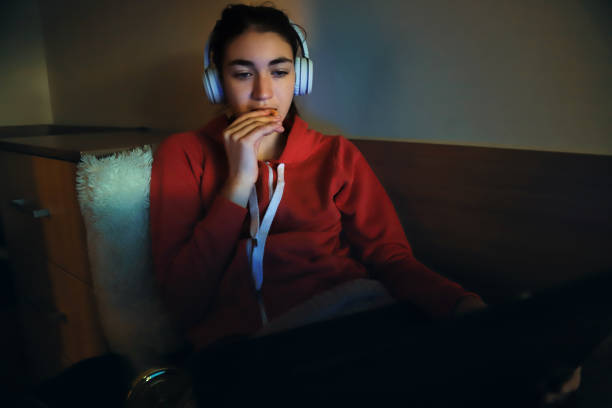 istock Girl watching TV 1365983949