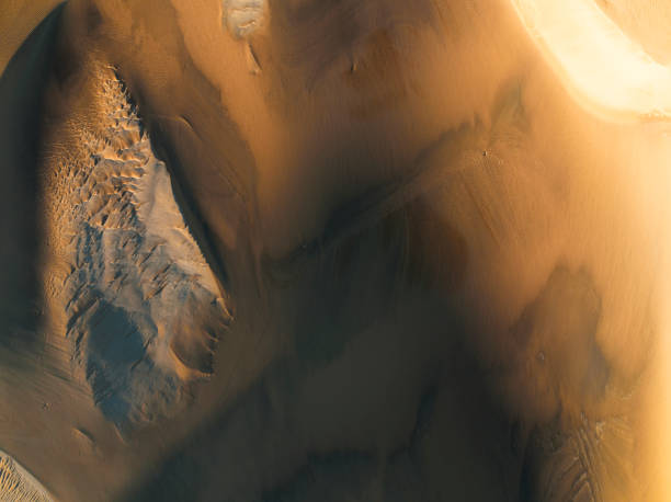 istock Abstract sand patterns in the dunes from above early morning 1365983997