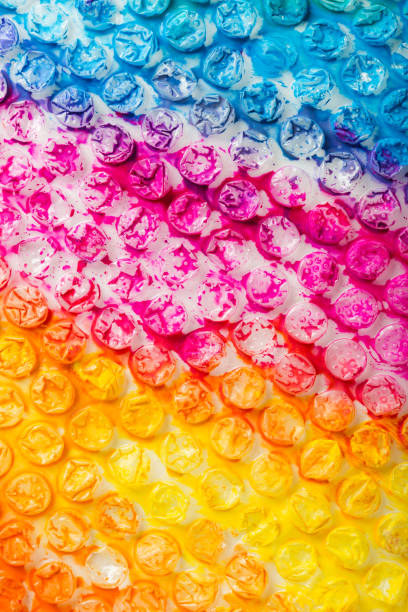 istock abstract background of colored bubble pack painted with paint 1365986113