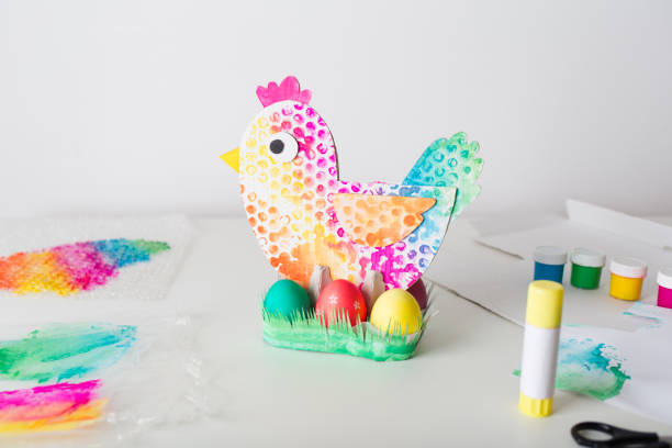 istock chicken made of cardboard - egg stand. easter decor. craft for kids. 1365986187