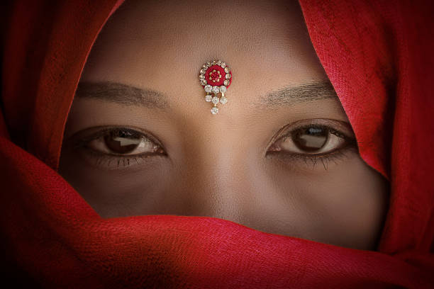 Asian Indian woman in traditional dress. CLICK FOR SIMILAR IMAGES AND LIGHTBOX WITH MORE ETHNIC FACES.