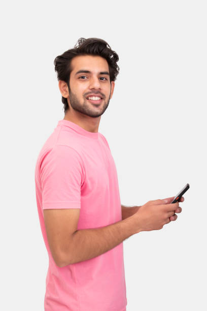 istock Young man using mbile phone stock photo 1365989437