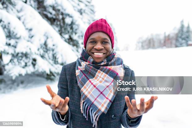 Brazilian Man Posing Outdoor In Winter Forest With Snow Bacground Stock Photo - Download Image Now