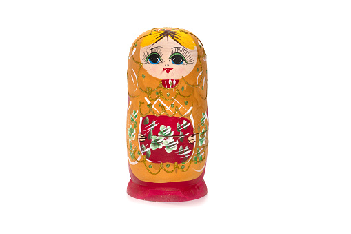 Bright colored nesting dolls on a white background. Russian national souvenir. Matryoshka. High quality photoBright colored nesting dolls on a white background. Russian national souvenir. Matryoshka.