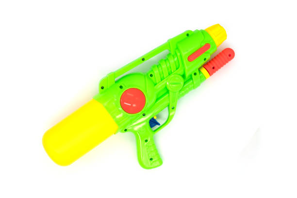 istock Green toy Water Gun on white background 1365993523