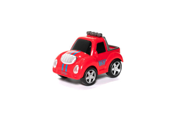 istock Children red toy car isolated on white. 1365994547