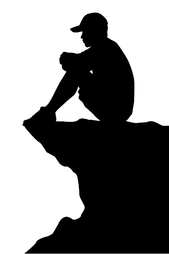 Lonely man is sitting on the cliff silhouette vector