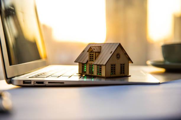 istock A house model on the laptop 1365999224