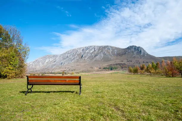 Photo of bench with view on piatra secuiului, romania, near rimetea, alba county