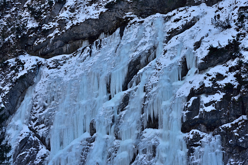 ice waterfall in dolomites mountains, Sappada Italy