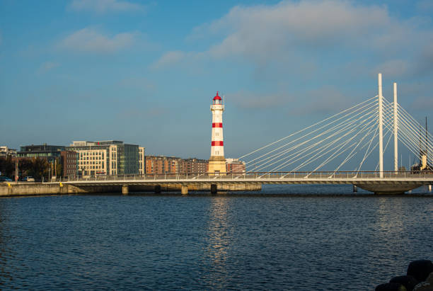 istock lighthouse and bridge in the city 1366007876