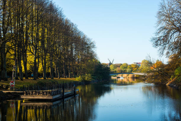 istock lake in the autumn park 1366008885