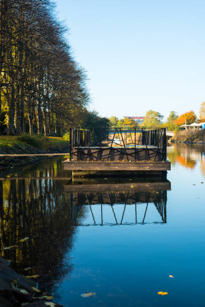 istock lake in the autumn park 1366008922