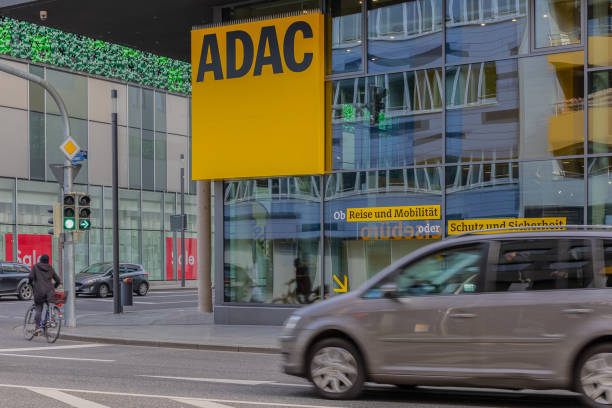 front of the local adac office. adac is europe's largest association for motoring,  motorsport and tourism interests - motoring imagens e fotografias de stock