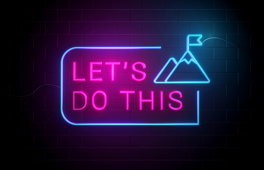 Let's Do This. Neon Motivation Concept. Colorful Neon Sign On Brick Wall.